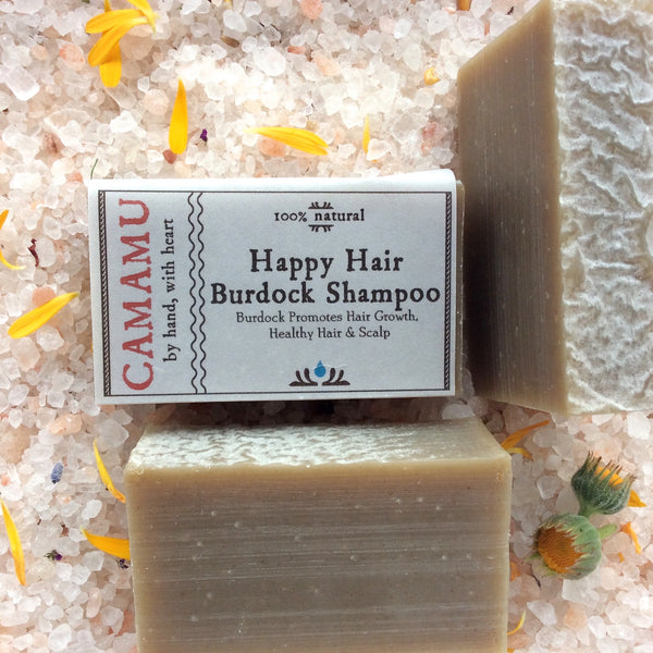 Camamu's Happy Hair Burdock Shampoo is a plastic-bottle free, all natural, handmade shampoo made from luscious, conditioning base oils and energizing minty essential oils.