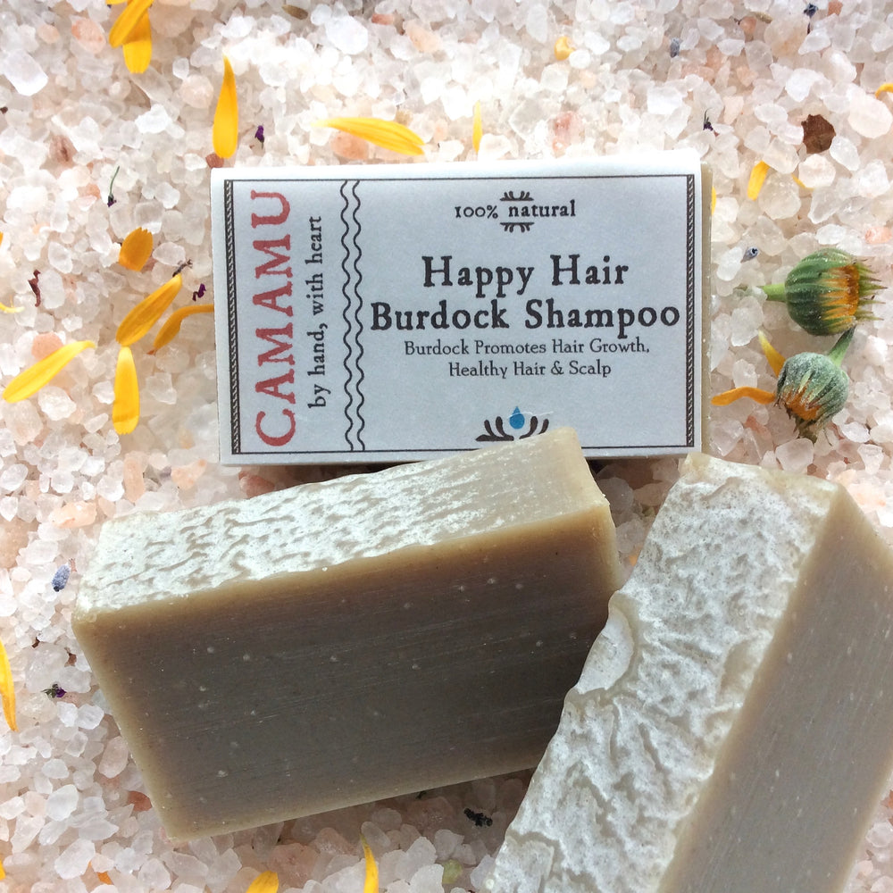 Camamu's Happy Hair Burdock Shampoo is a plastic-bottle free, all natural, handmade shampoo made from luscious, conditioning base oils and energizing minty essential oils.