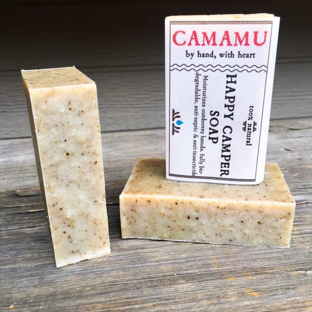 Three bars of soap with labels.